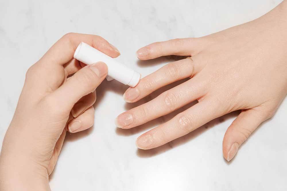 lip balm on cuticles DIY Beauty Hacks